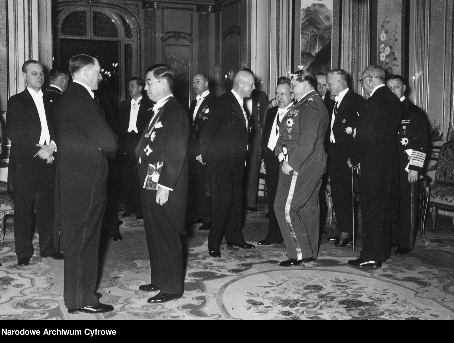 Adolf Hitler in conversation with the Japanese ambassador in Berlin, Muschakoje Kimitomo, during a reception in the Japanese embassy